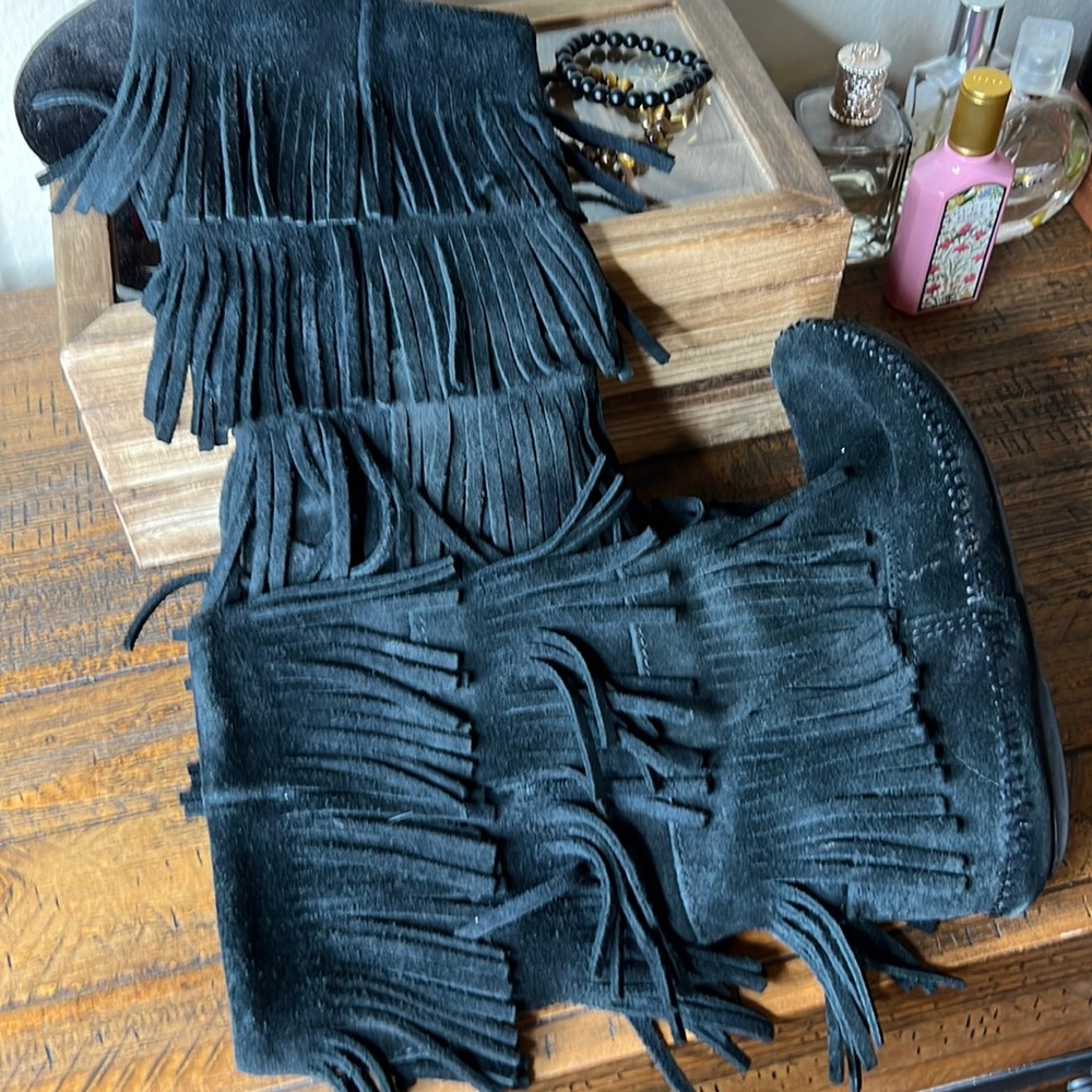 Minnetonka black fringe boots